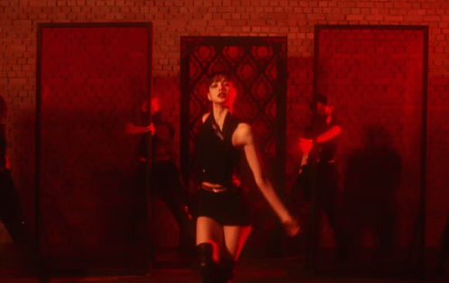 Group Of Women Dancing In Dark Room GIF