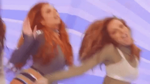 Group Of Women Dancing On Purple Background GIF