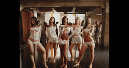 Group Of Women Dancing One In White Top GIF
