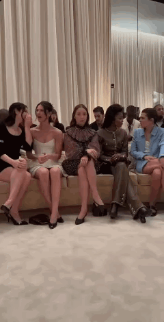 Group of Women Sitting on Couch Talking