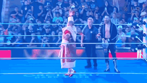 Group of Wrestlers in Wrestling Ring