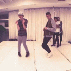 Group Of Young Men Dancing GIF