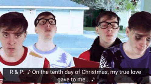 Group of Young Men Singing Christmas Carols