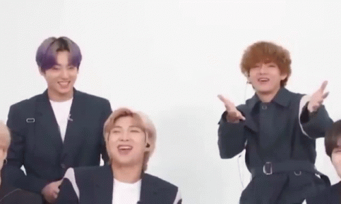 Group Of Young Men Sitting Together GIF