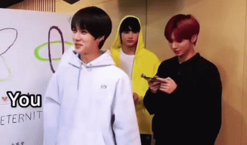 Group Of Young Men Standing Together GIF