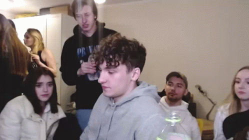 Group of Young People in Room With Private Hoodie
