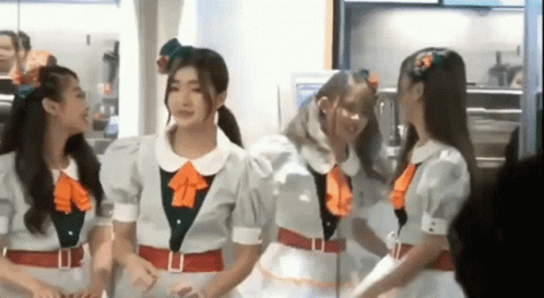 Group Of Young Women Standing Together GIF