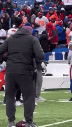 Group On Football Field With Man In Number 78 Shirt GIF