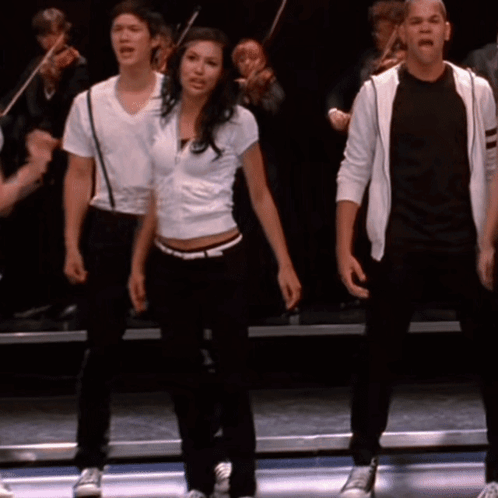 Group On Stage One In White Shirt GIF