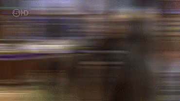 Group Playing In Living Room With BB Sign GIF