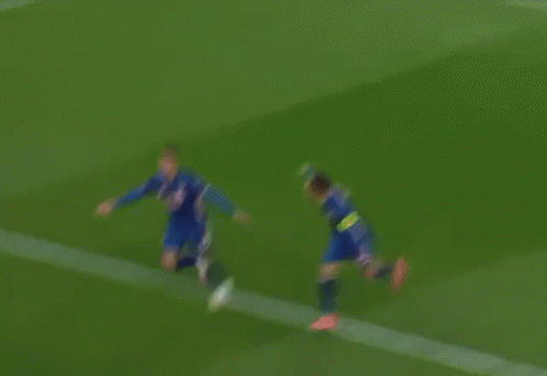 Group Playing Soccer