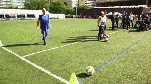 Group Playing Soccer with Eurosport