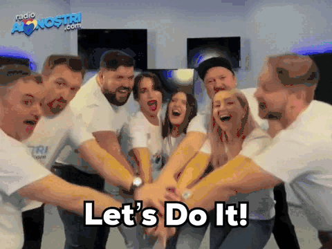 Group Putting Hands Together Saying Let's Do It