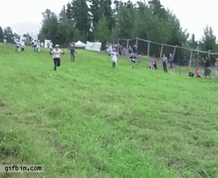 Group Running Down Hill In Field GIF