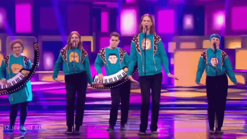 Group Singing on Stage with 12 Iceland