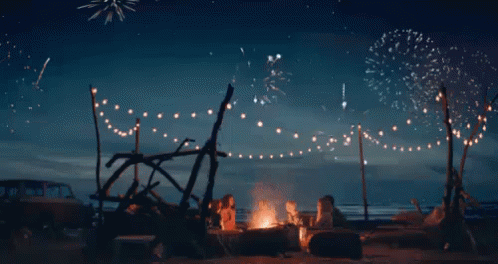 Group Sitting Around Campfire Buon Ferragosto GIF