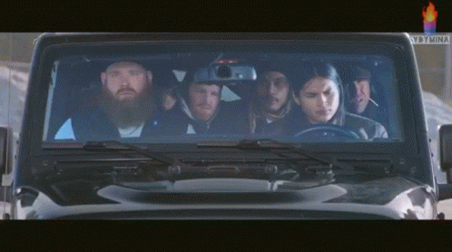 Group Sitting in Car With Netflix Sticker