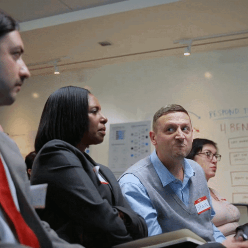 Group Sitting In Front Of Remaining Time GIF