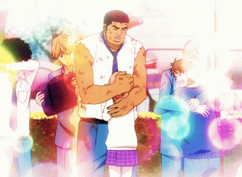 Group Standing Around Man Holding Girl