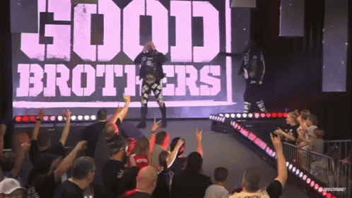 Group Standing Before Good Brothers Sign