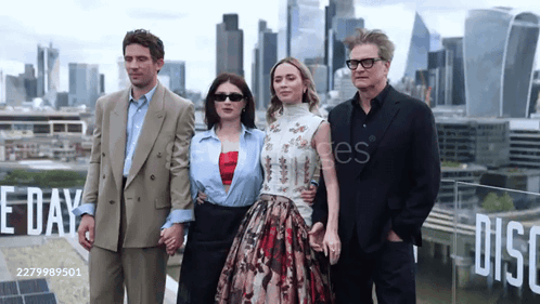 Group Standing In Front Of Disco Sign GIF