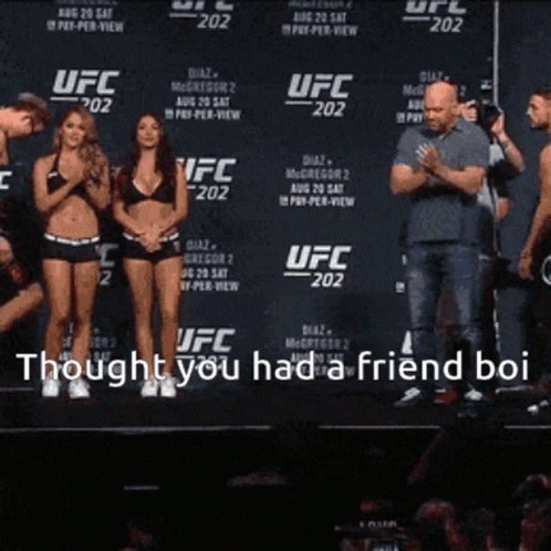 Group Standing in Front of Thought You Had a Friend Boi Sign