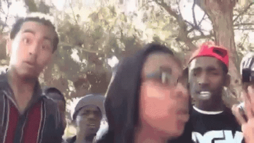 Group Standing In Front Of Tree GIF