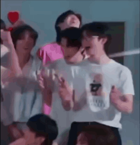 Group Standing With Pink Heart