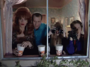 Group Taking Selfie in Mirror