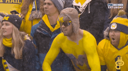 Group Watching Football Game on Saturday