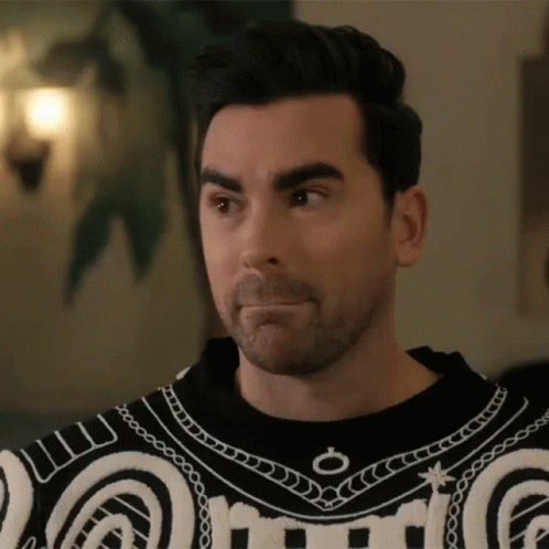 Grumpy Dan Levy Eye Roll Meme GIF