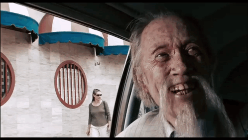 Grumpy Old Man Showing His Tongue GIF