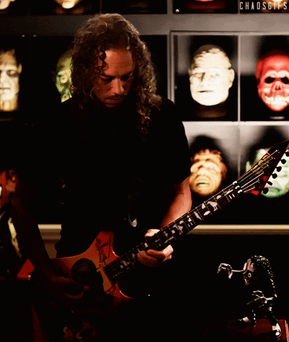 Guitarist with Skull Display Chaos