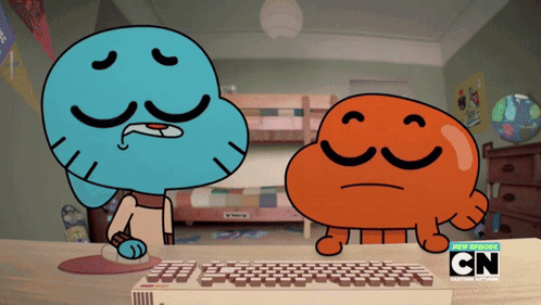 Gumball and Darwin Sitting in Front of Keyboard