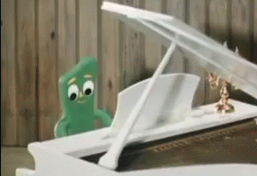 Gumby Green Cartoon Playing Piano GIF