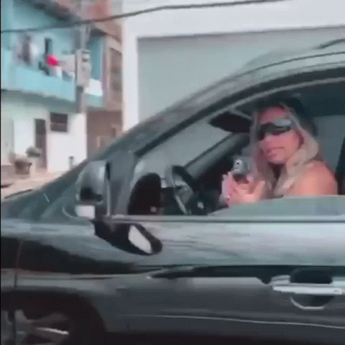 Gun Woman On The Van GIF