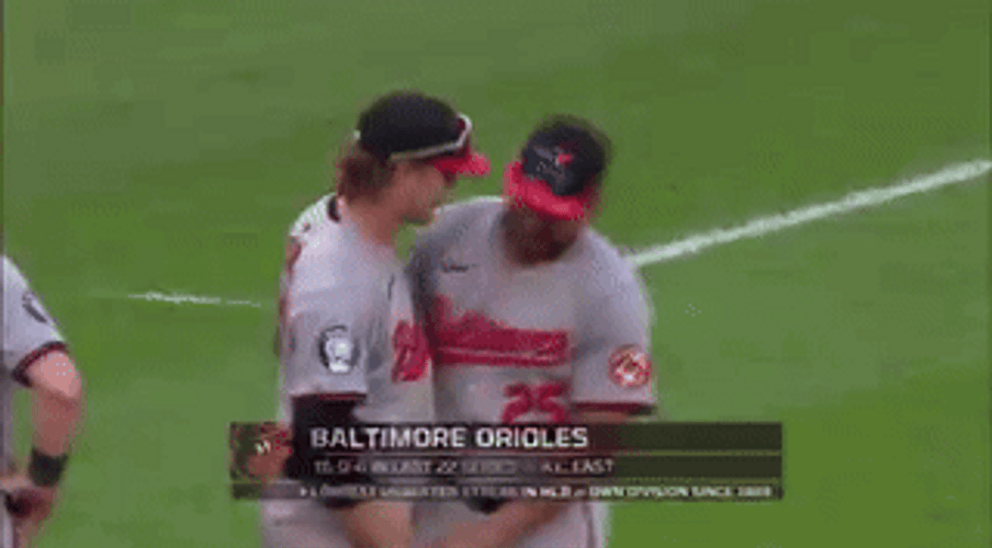 Gunnar Henderson Hugging Teammates GIF