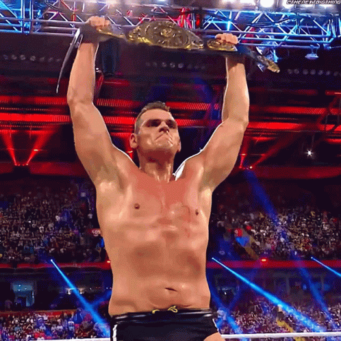 Gunther Flexing Championship GIF