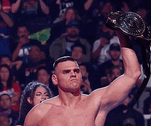 Gunther Raising Championship Belt GIF