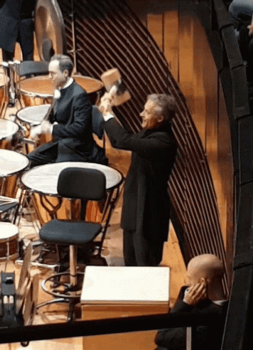 Gustav Mahler Holding Hammer GIF