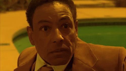 Gustavo Fring Trying To Attack A Man GIF