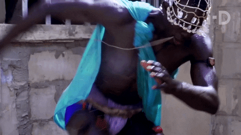 Guy As Tribal Chief Dancing Wearing Blue Fabric GIF
