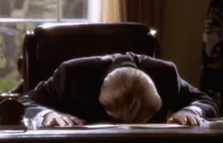Guy Bang His Head On Desk GIF