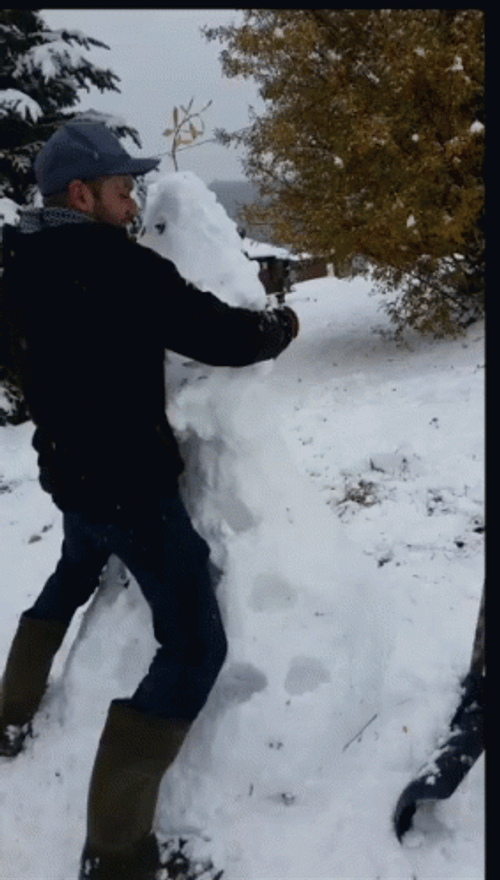 Guy Destroy The Snowman GIF