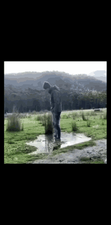 Guy Doing A Flip In A Puddle GIF