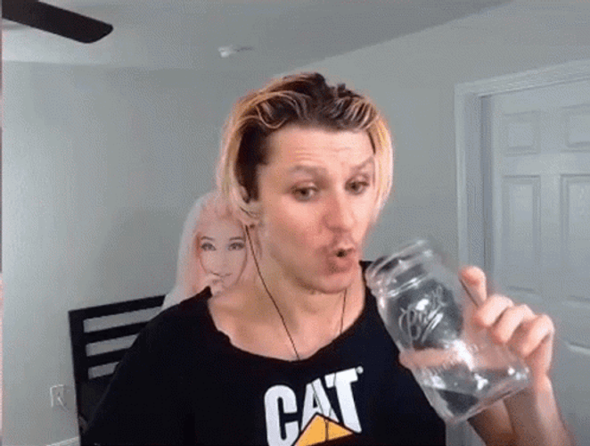 Guy Drinking Water On Water Jar GIF