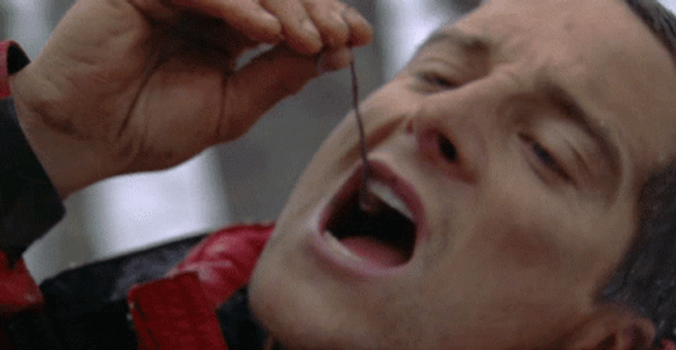 Guy Eating Worm GIF