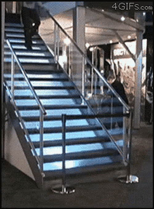 Guy Falling Down Stairs Recovered Like Nothing Happened GIF