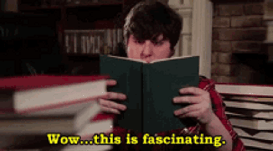 Guy Fascinated Reading Book GIF