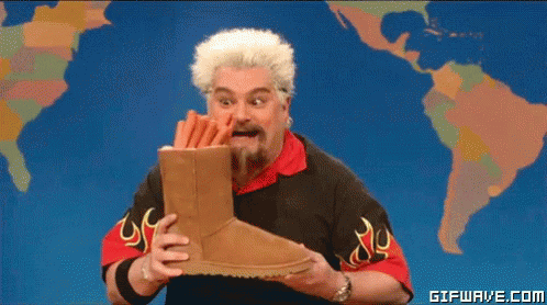 Guy Fieri Holding Brown Boots GIF